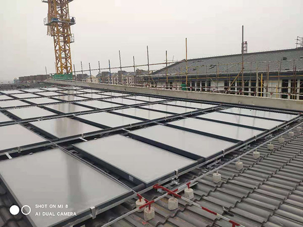 平板太陽能+容積式換熱器+燃氣鍋爐輔助熱水系統